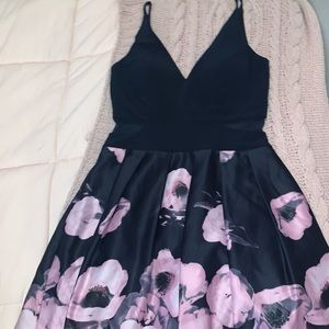 A dress with pink flowers